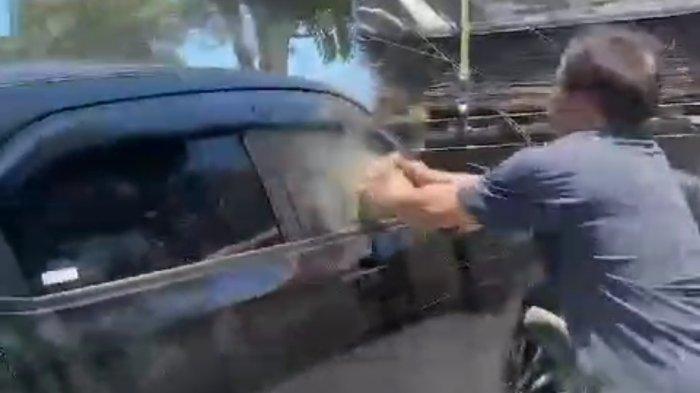 viral-video-man-breaking-car-window-in-banyuwangi,-police-call-suspected-domestic-quarrel-–-tribunjatim.com